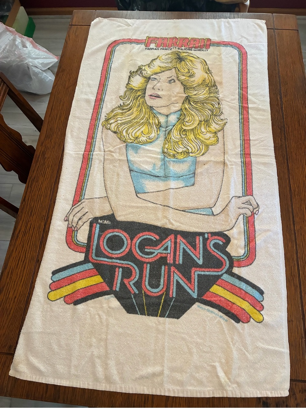 Logan's Run Decorative Beach Towel - Cream with Yellow and Blue Graphic